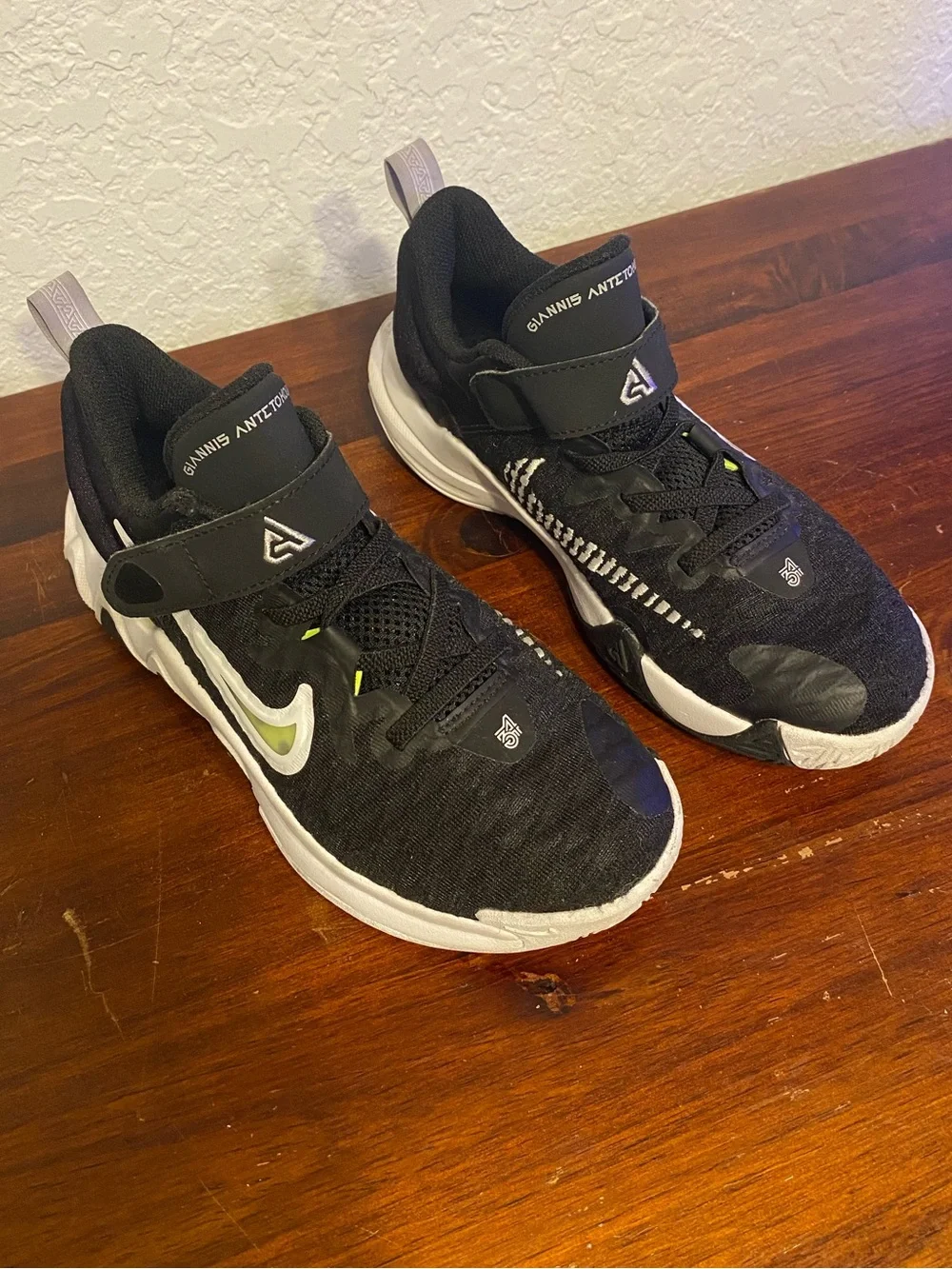 Nike Kids Black Sneakers with White Soles and Lime Accent